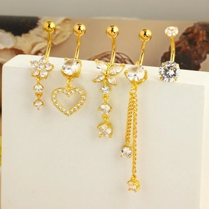 Five-piece set of gold heart and butterfly belly rings with sparkling zircon gemstones