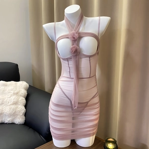 Pink sheer mesh bodysuit with hollow bust and 3D flower details on white mannequin