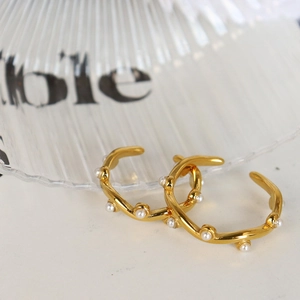 French vintage spiral gold earrings with elegant pearl inlays and wave pattern details