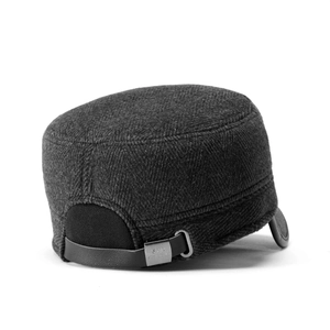 Detail view of winter cadet hat showing herringbone wool texture and adjustable metal buckle