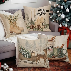 Set of four Christmas linen pillow covers with reindeer and winter motifs on grey sofa