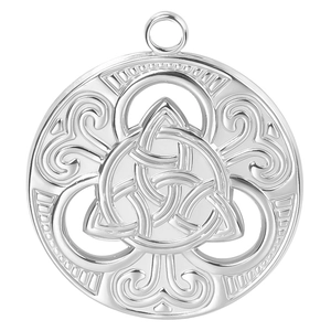 Detailed macro view of a silver circular Celtic knot pendant with hollowed scroll design