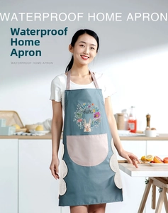 Detail of waterproof apron featuring side coral fleece towels and large front pocket