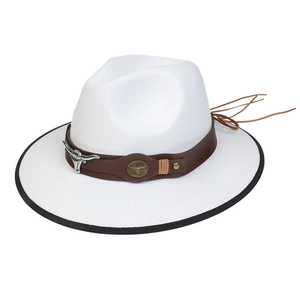 Detailed close-up of white cowboy hat with silver bull head and leather trim
