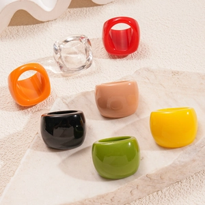 Colorful chunky resin rings set in various vibrant tones with a minimalist square design