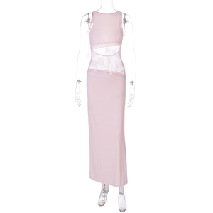 Detail of pink sleeveless long dress featuring lace patchwork and waist cut-out