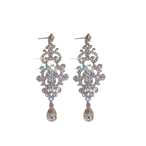 Elegant silver teardrop earrings with hollow vintage pattern and shimmering crystals