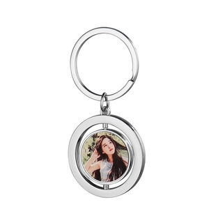 Sublimation spinning metal keychain with personalized photo frame on white background