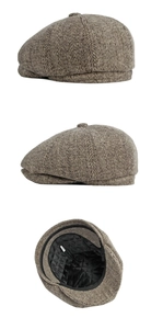 Détails de l'intérieur d'une casquette gavroche marron, doublure matelassée et étiquette XL