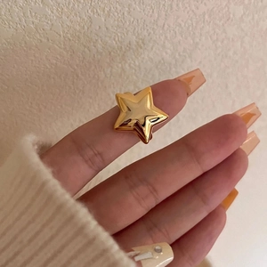 Minimalist 18k gold plated stainless steel star ring with an open adjustable design