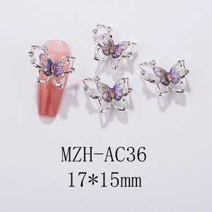 Detailed view of Aurora butterfly nail art charms with pearls and rhinestones 17*15mm