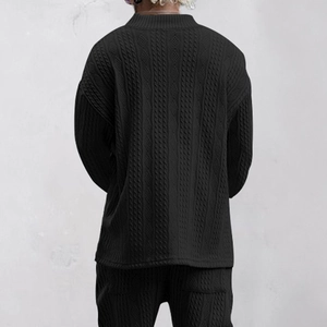 Detailed back view of men's black cable knit set highlighting premium fabric texture