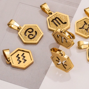 18K gold-plated hexagonal zodiac pendants with sandblasted finish on a split-tone surface