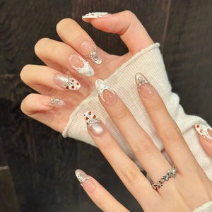 Handmade press-on nails with crystal cherry, pearl accents and white lace patterns