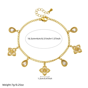 Detail of gold bracelet with 1.2cm colorful rhinestone teardrop and flower charms