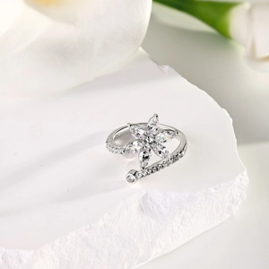 Close-up of S925 sterling silver flower ring with marquise zircons and adjustable band