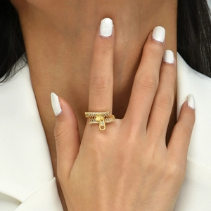 Adjustable zipper ring in gold plating with sparkling white zircon stones on model