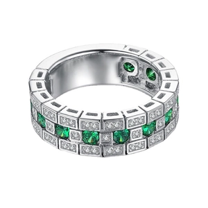 Vintage wide band ring in silver with geometric brick pattern and green gemstones