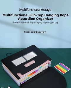 Detail of multi-layer expanding file folder with colorful tabs and secure elastic closure