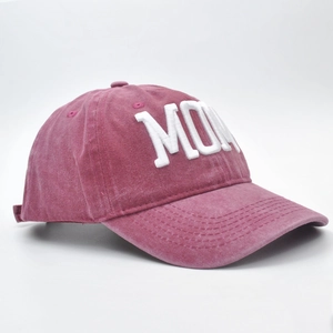Detail of 3D embroidered MOM text on vintage red washed cotton baseball cap