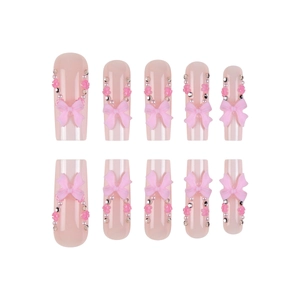 Long ballet press-on nails with pink 3D bows, flowers and pearls on nude pink base