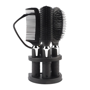 4-piece black hair styling set with round storage stand for professional grooming use