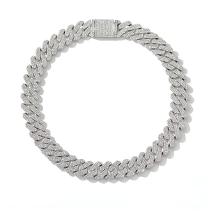 Macro shot of 20mm silver Cuban link chain with three rows of cubic zirconia stones