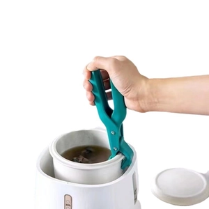 Green anti-scald bowl clip gripper for hot dishes with non-slip silicone and metal handle