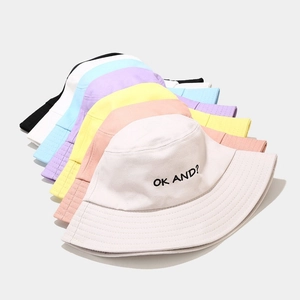 Unisex cotton bucket hat featuring 'OK AND?' embroidery in eight trendy colors