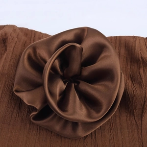 Brown vacation set with 3D satin flower detail and textured pleated fabric skirt