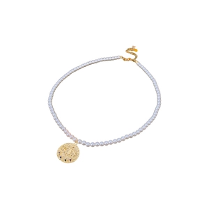 Collier de perles vintage doré à l'or avec pendentif œil maléfique et zircons