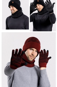 Close-up of winter knit set including fleece-lined hat, scarf, and touchscreen gloves
