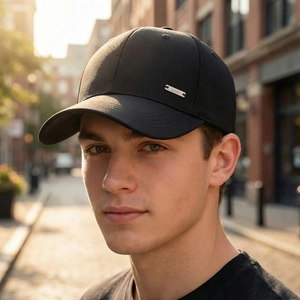 Classic black baseball cap for men with a curved brim and a stylish side metal plate detail