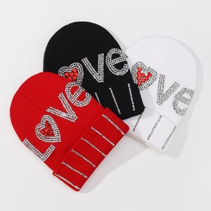 Winter knitted beanie hats with rhinestone LOVE pattern in red, black, and white colors