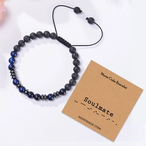 Detail of Soulmate Morse code bracelet with natural tiger eye stones on display card