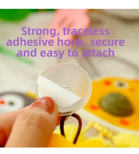 Detail of the strong adhesive hook and elastic rope for the hanging cat toy