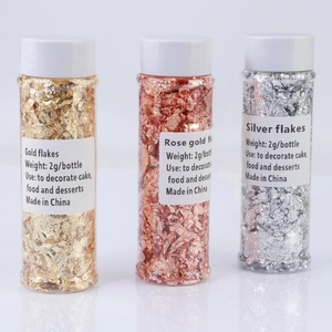 Set of 2g edible gold, rose gold and silver foil flakes for cake and dessert decoration