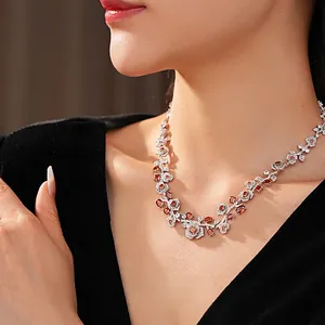 Vintage style necklace featuring red zirconia roses and silver floral accents for women