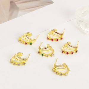 Three-layer C-shaped gold hoop earrings featuring vibrant pink zircon stones for women