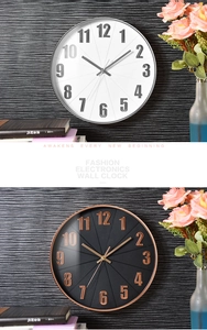 Detail of round wall clocks with radial texture and 3D Arabic numerals in black and rose gold