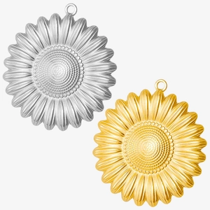Detailed macro shot of vintage sunflower pendants in silver and gold stainless steel