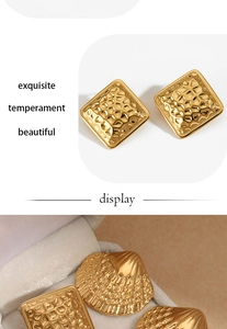 Detailed close-up of gold scalloped and square textured earrings with hammered metal finish