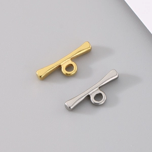 Close-up of gold and silver plated stainless steel OT toggle clasps for jewelry making