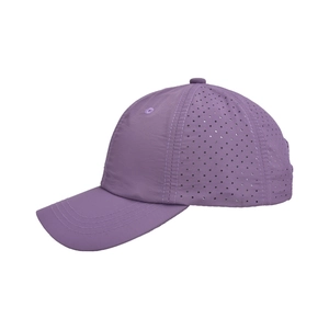 Detail of purple quick-dry sun hat with laser-cut ventilation holes and mesh fabric