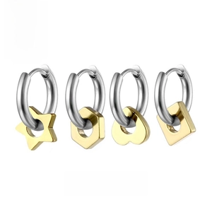 Detailed view of four stainless steel hoop earrings with gold geometric star and heart charms