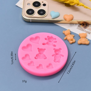 Pink silicone mold with cartoon bear and heart patterns for DIY fondant and chocolate crafts