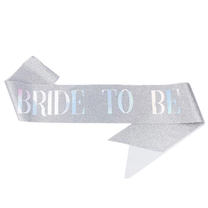 Detailed view of silver glitter Bride To Be sash with holographic lettering for bachelorette party