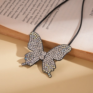 Elegant butterfly pendant necklace with sparkling rhinestones on a black woven cord