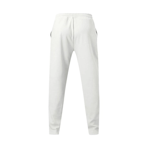 Detail view of white drawstring waistband and knit texture on men's relaxed sports pants