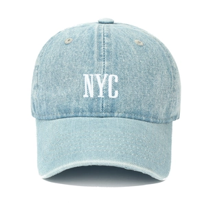 Light blue washed denim baseball cap with white NYC embroidery and pre-curved brim
